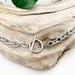 Chunky silver stainless steel necklace with a toggle clasp for a statement look