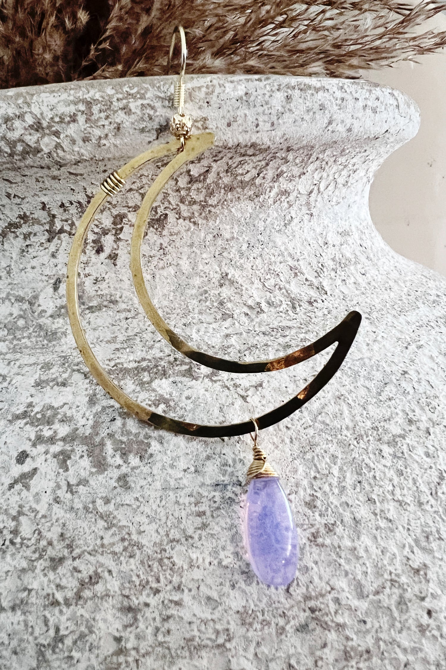 crescent moon earring, hammered and with a purple wired gemstone droplet
