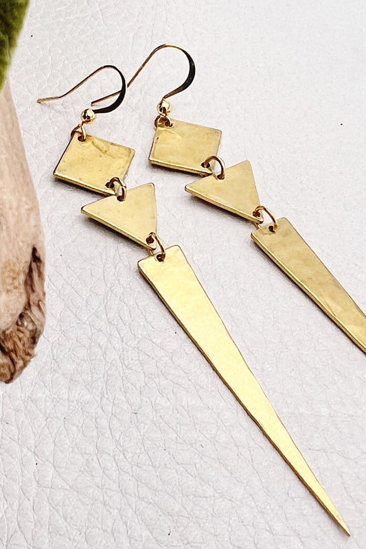 golden boho earrings with geometric shapes 