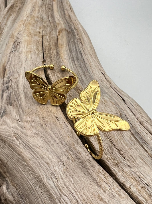 Dainty gold-plated stainless steel rings with butterfly. Adjustable, waterproof, and hypoallergenic.