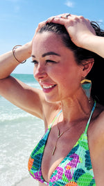 woman in bikini at siesta key beach wearing jewelry